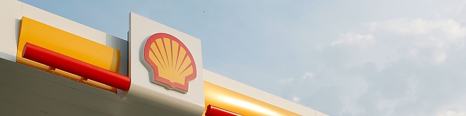 Logo de Shell con el cielo azul y las nubes