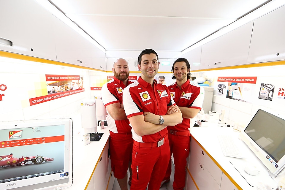 Formula 1 drivers standing in Shell's Track Lab
