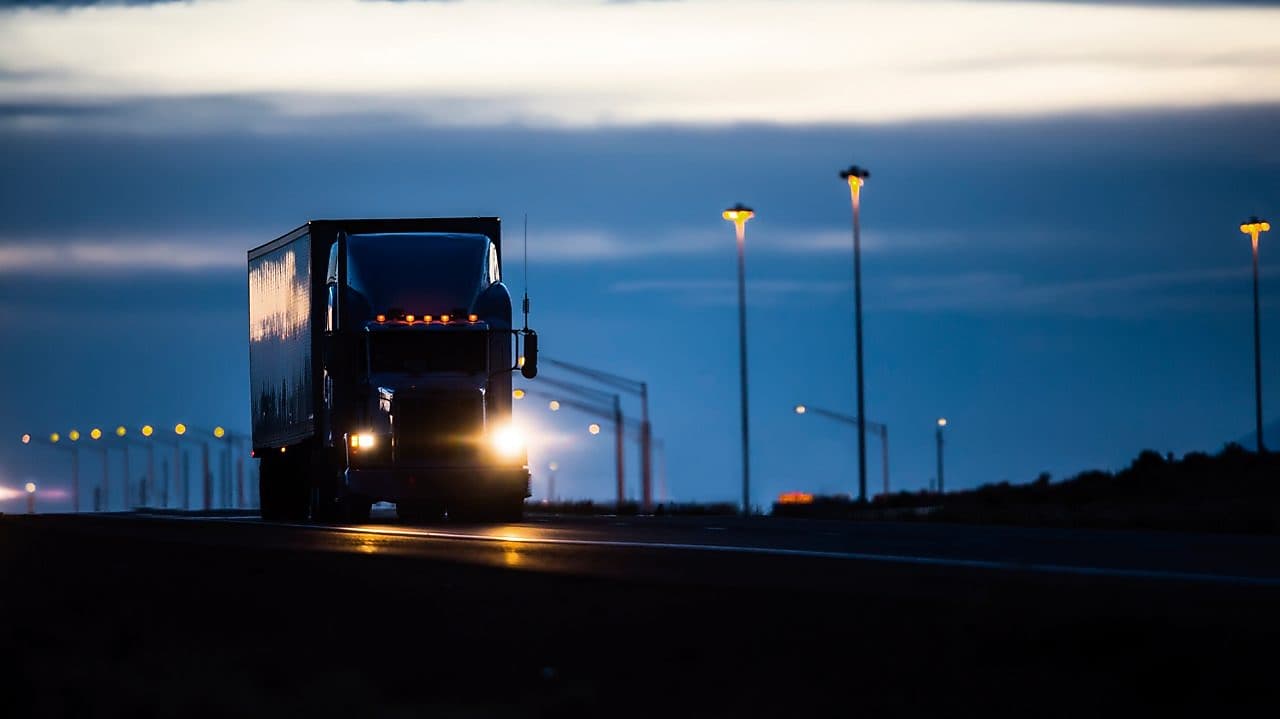 Truck on the road at night
