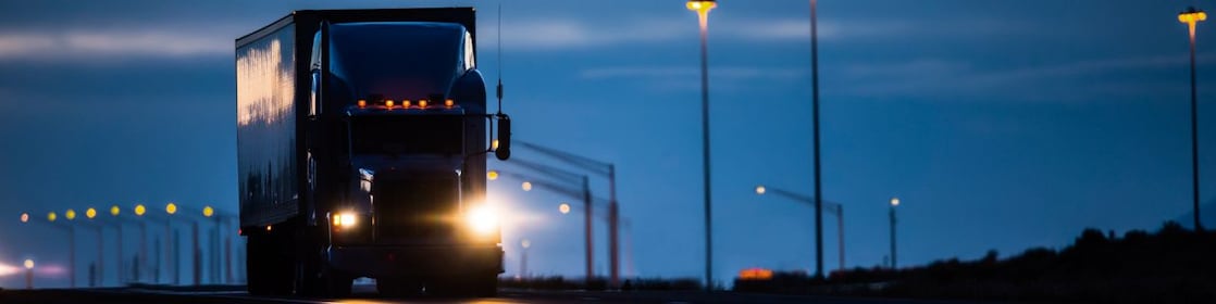 Truck on the road at night