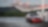Red car in Shell forecourt