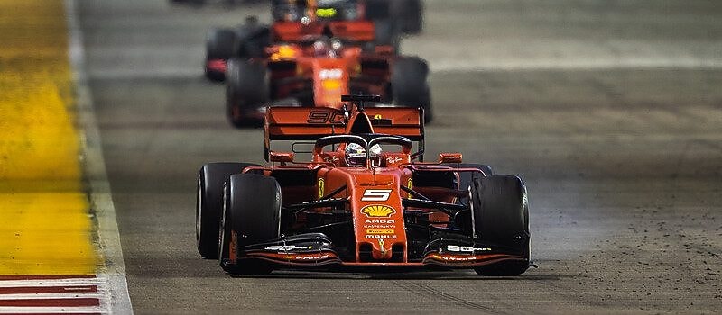 Maurice Trintignant driving his Ferrari Formula 1 car at the Monaco Grand Prix in 1955