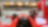 Ferrari dentro de un garaje cerca de una pista