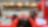 Ferrari dentro de un garaje cerca de una pista