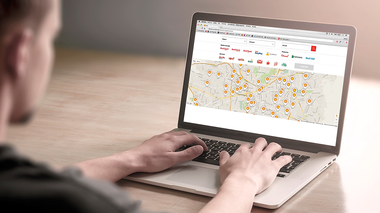 Man looking at a map on a computer