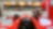 Ferrari dentro de un garaje cerca de una pista